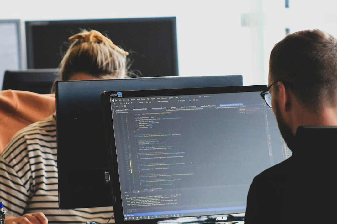 diverse group of programmers coding