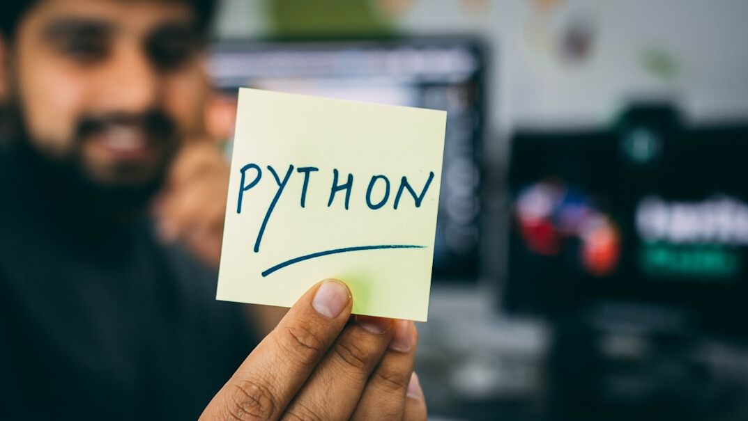 instructor teaching coding in english