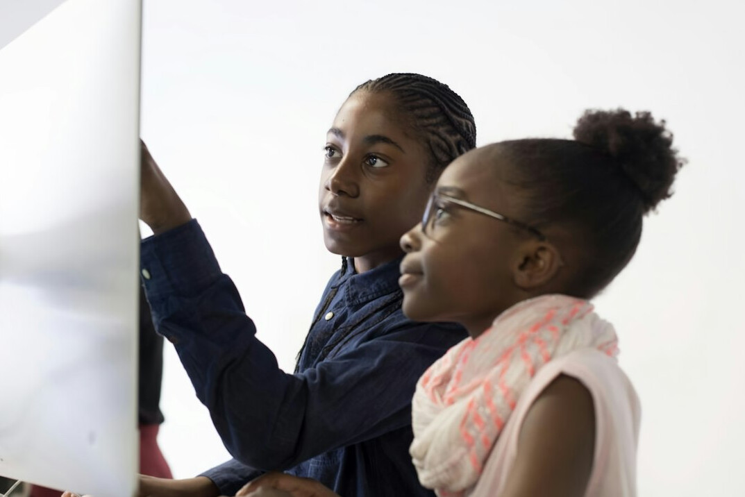 diverse students learning programming